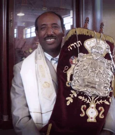 Kokeb Gedamu carrying torah